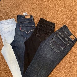 Four pairs of jeans size 4